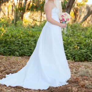Elegant White Strapless Wedding Gown with Silver Embellishments